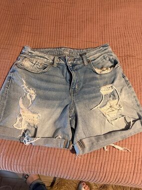 Women’s Light Blue Distressed Denim Shorts with Rolled Cuff